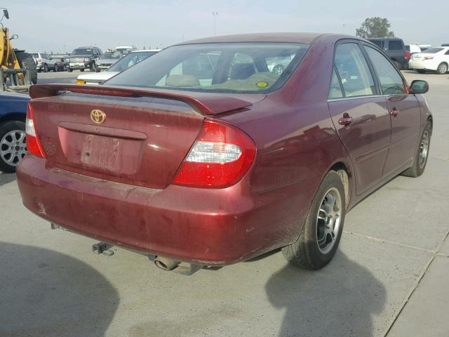 JTDBE32K320026928 - 2002 TOYOTA CAMRY LE RED photo 4