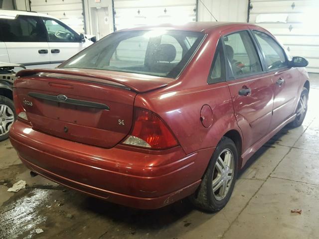 1FAFP34Z54W139730 - 2004 FORD FOCUS SE C RED photo 4