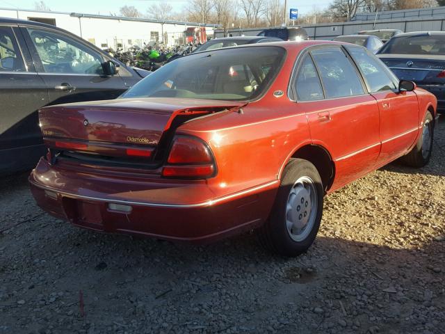 1G3HC52K2X4827569 - 1999 OLDSMOBILE 88 50TH AN RED photo 4