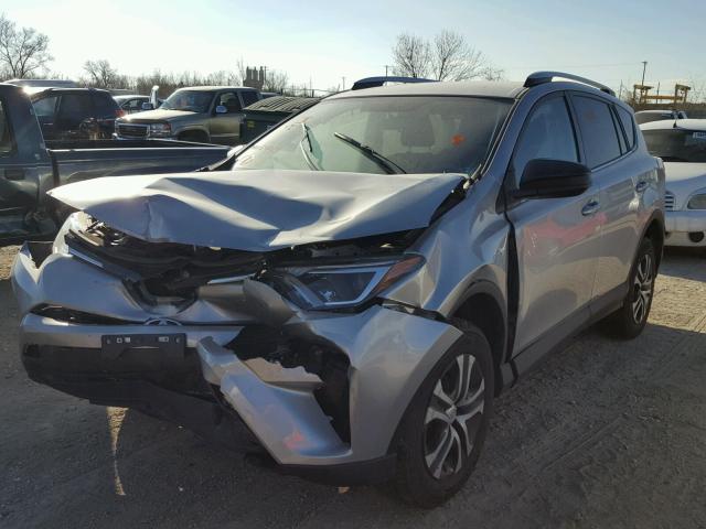 2T3ZFREV4GW294071 - 2016 TOYOTA RAV4 LE GRAY photo 2