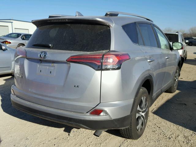 2T3ZFREV4GW294071 - 2016 TOYOTA RAV4 LE GRAY photo 4