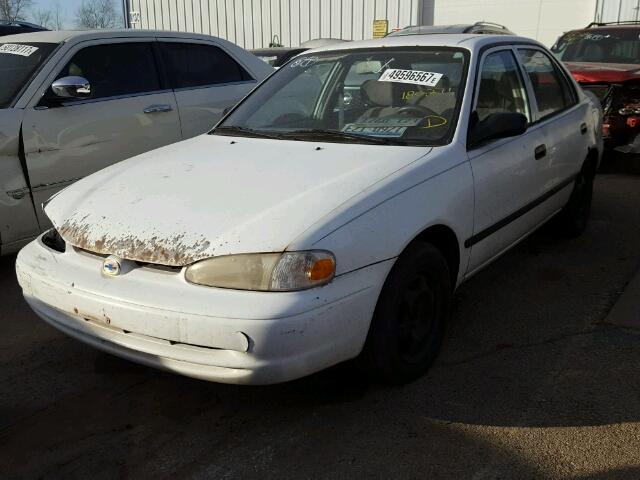 1Y1SK5289XZ404581 - 1999 CHEVROLET GEO PRIZM WHITE photo 2