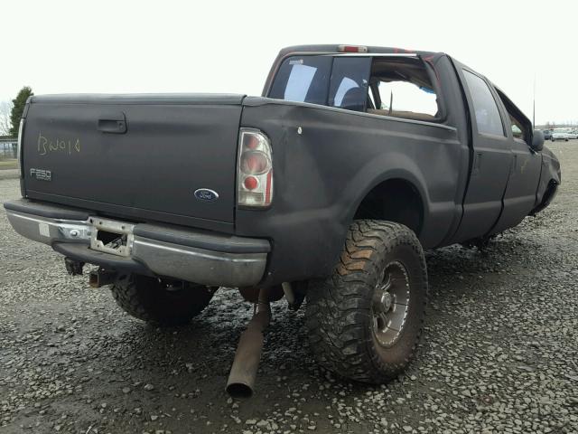 1FTNW21F3XEC12049 - 1999 FORD F250 SUPER BLACK photo 4