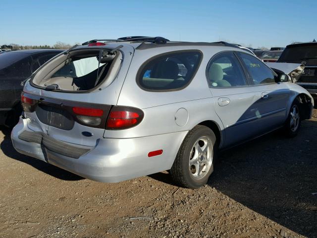 1FAFP58SXYA206625 - 2000 FORD TAURUS SE SILVER photo 4