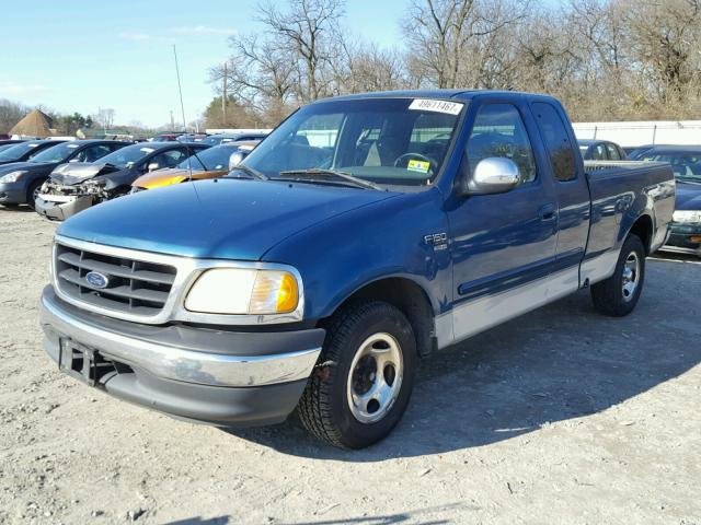 1FTRX17W31NA25692 - 2001 FORD F150 TEAL photo 2