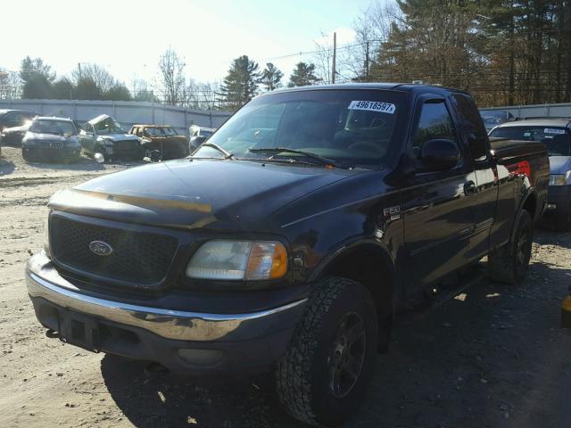 1FTRX18L62NA59440 - 2002 FORD F150 BLACK photo 2