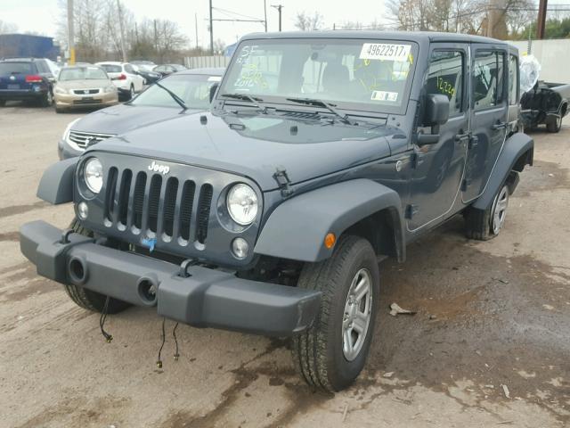 1C4BJWDG3GL319577 - 2016 JEEP WRANGLER U GRAY photo 2