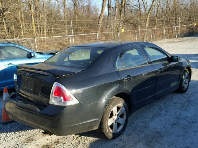 3FAFP07Z46R215129 - 2006 FORD FUSION SE BLACK photo 4