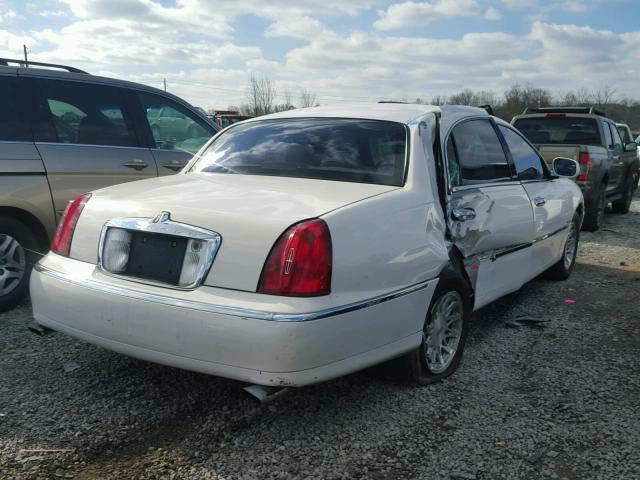 1LNHM82W1XY699847 - 1999 LINCOLN TOWN CAR S WHITE photo 4