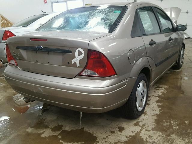 1FAFP33P84W152486 - 2004 FORD FOCUS LX TAN photo 4