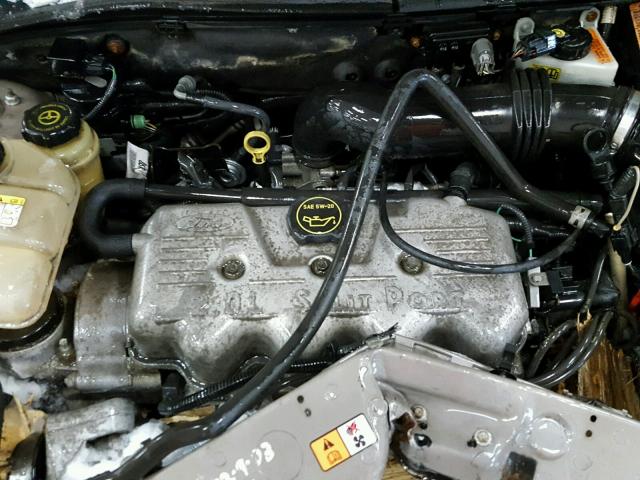 1FAFP33P84W152486 - 2004 FORD FOCUS LX TAN photo 7