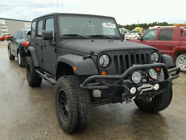 1J4BA5H1XBL571975 - 2011 JEEP WRANGLER U BLACK photo 1