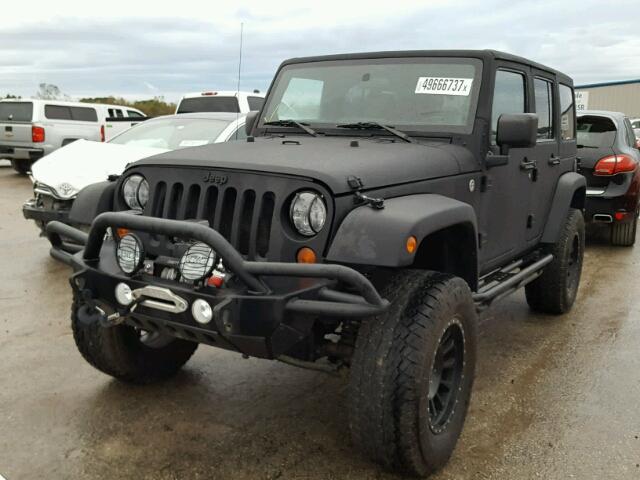 1J4BA5H1XBL571975 - 2011 JEEP WRANGLER U BLACK photo 2
