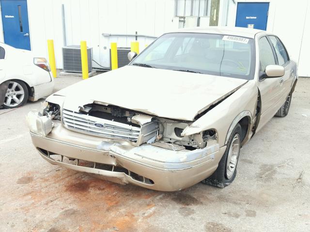 2FAFP74W5XX210138 - 1999 FORD CROWN VICT GOLD photo 2