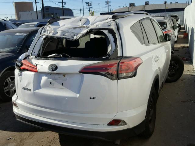 2T3ZFREV2GW299804 - 2016 TOYOTA RAV4 LE WHITE photo 4