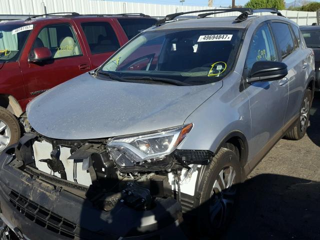 2T3ZFREVXHW379093 - 2017 TOYOTA RAV4 LE SILVER photo 2