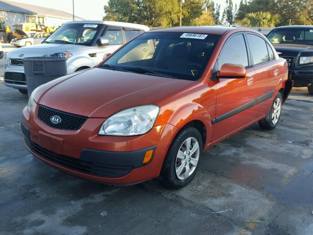 KNADE223096531602 - 2009 KIA RIO BASE ORANGE photo 2