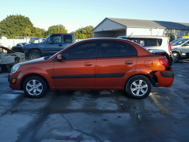 KNADE223096531602 - 2009 KIA RIO BASE ORANGE photo 9