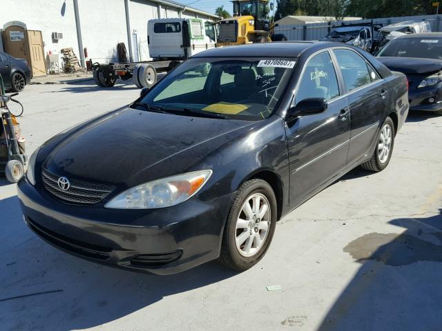 4T1BE30K52U099239 - 2002 TOYOTA CAMRY LE 黑色 照片 2