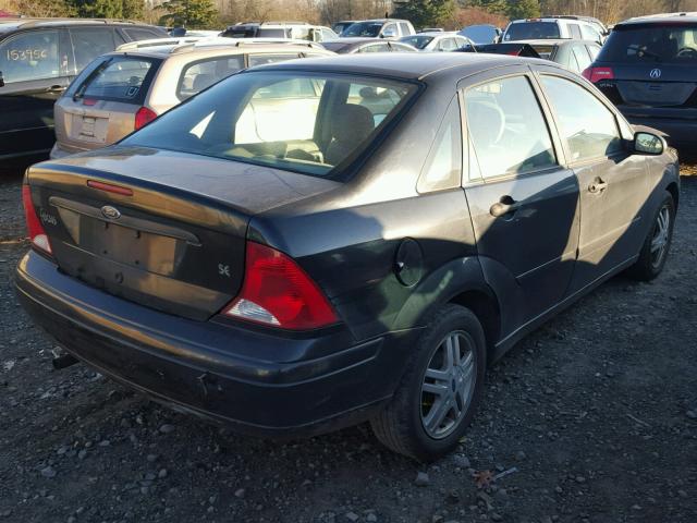 1FAFP3432YW406114 - 2000 FORD FOCUS SE BLACK photo 4