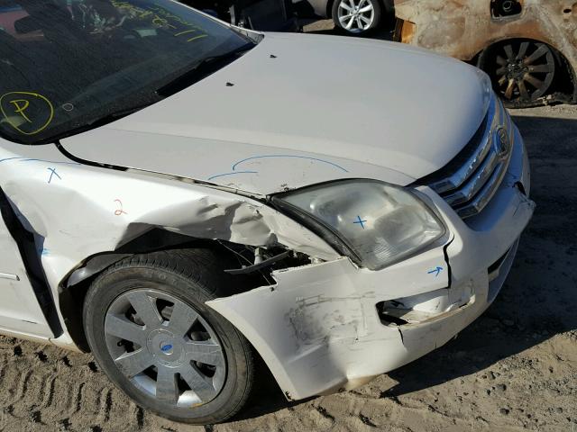 3FAHP06Z59R211959 - 2009 FORD FUSION S WHITE photo 9