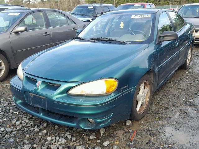 1G2NW52E9XM781747 - 1999 PONTIAC GRAND AM G GREEN photo 2