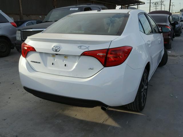 5YFBURHE0HP606384 - 2017 TOYOTA COROLLA L WHITE photo 4