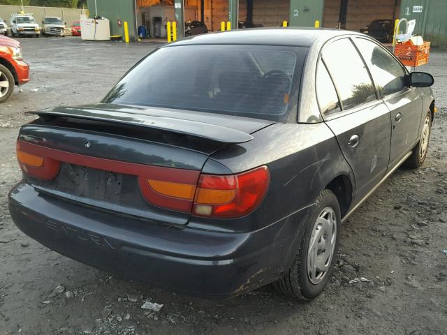 1G8ZJ527XYZ262945 - 2000 SATURN SL2 BLACK photo 4