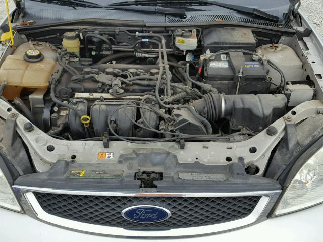 1FAFP34N26W115112 - 2006 FORD FOCUS ZX4 SILVER photo 7