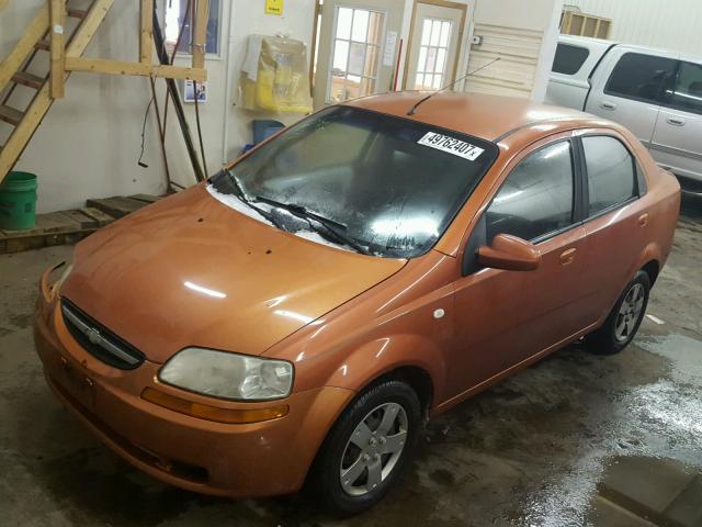 KL1TD566X6B525193 - 2006 CHEVROLET AVEO BASE ORANGE photo 2