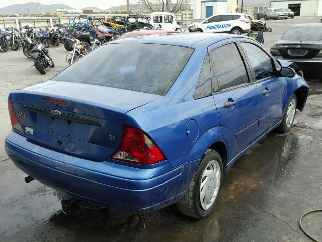 1FAFP34384W127907 - 2004 FORD FOCUS SE C BLUE photo 4