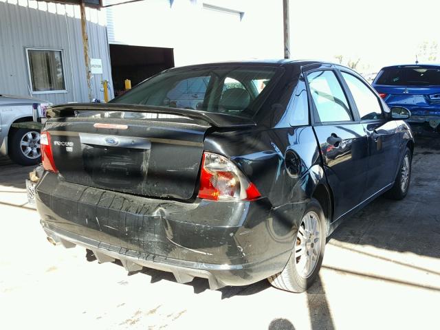 1FAFP34N87W169516 - 2007 FORD FOCUS ZX4 BLACK photo 4