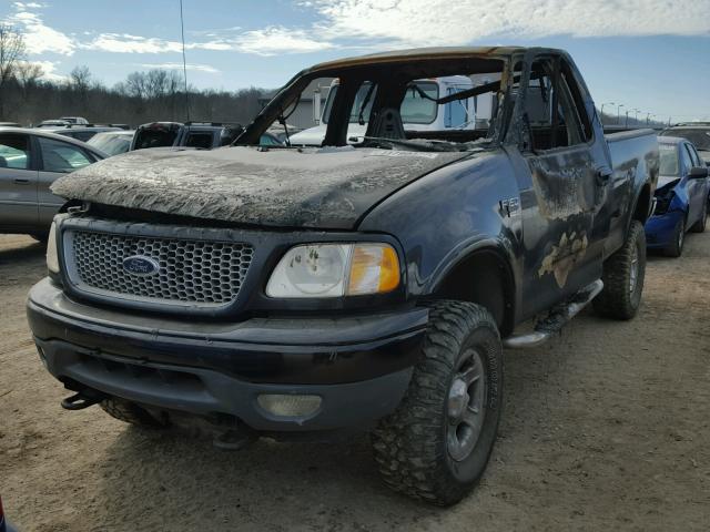 1FTRX18W0XNC34766 - 1999 FORD F150 BLACK photo 2