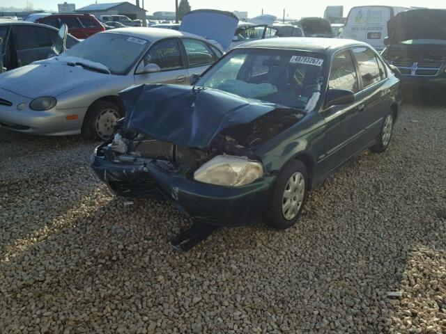 1HGEJ6570XL022585 - 1999 HONDA CIVIC LX GREEN photo 2