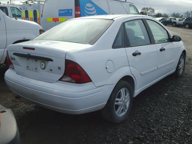 1FAFP34354W187501 - 2004 FORD FOCUS SE C WHITE photo 4