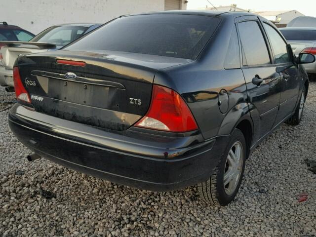 1FAFP38Z44W137221 - 2004 FORD FOCUS ZTS BLACK photo 4