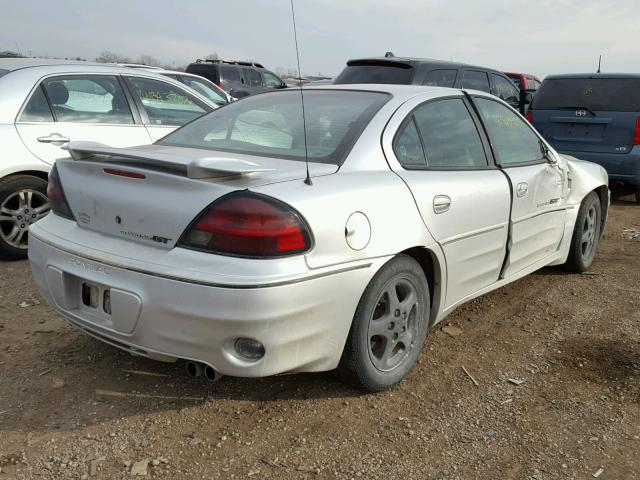 1G2NV52EX2M585022 - 2002 PONTIAC GRAND AM G SILVER photo 4