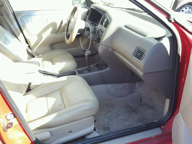 JNKCP11A4XT011659 - 1999 INFINITI G20 RED photo 5