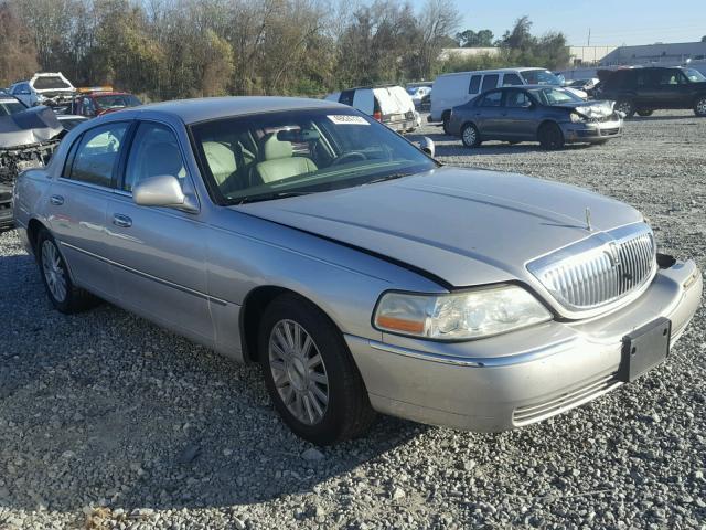 1LNHM81W63Y704195 - 2003 LINCOLN TOWN CAR E SILVER photo 1