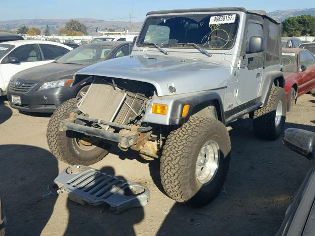 1J4FA29174P763218 - 2004 JEEP WRANGLER / SILVER photo 2