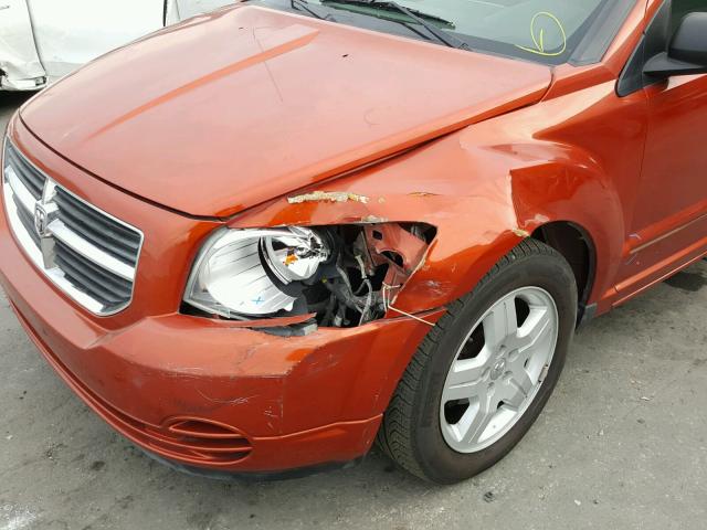 1B3HB48B28D655857 - 2008 DODGE CALIBER SX ORANGE photo 9