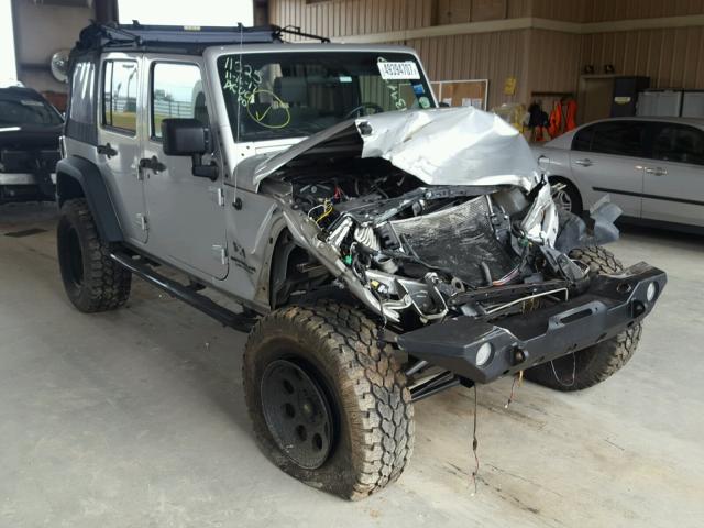 1J4GA39119L749940 - 2009 JEEP WRANGLER U SILVER photo 1