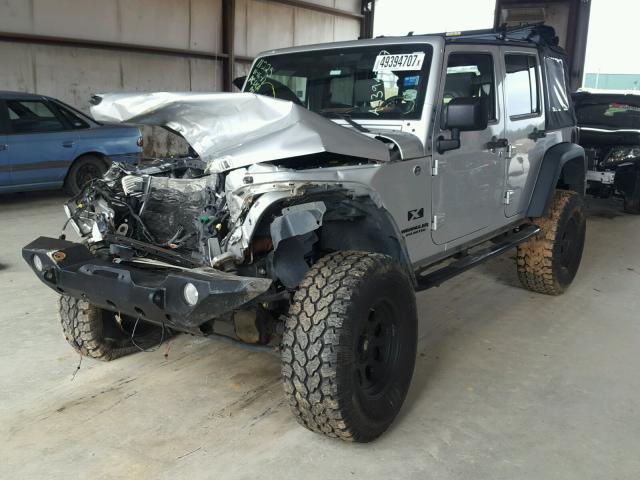1J4GA39119L749940 - 2009 JEEP WRANGLER U SILVER photo 2