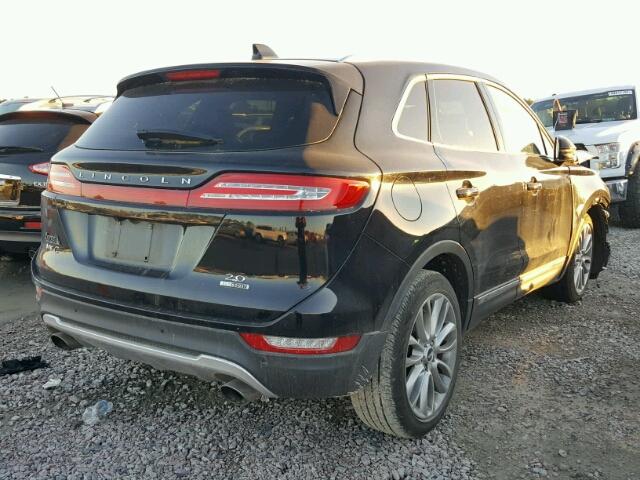 5LMCJ3C92GUJ22117 - 2016 LINCOLN MKC RESERV BLACK photo 4