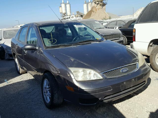 1FAFP34N67W251602 - 2007 FORD FOCUS ZX4 GRAY photo 1