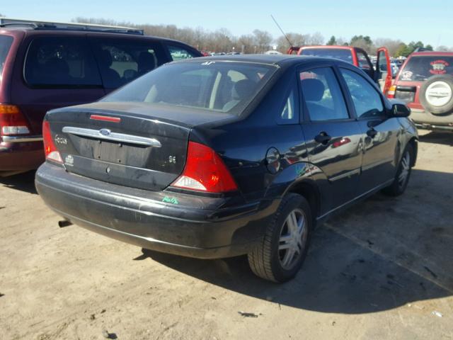 1FAFP34PX1W152872 - 2001 FORD FOCUS SE BLACK photo 4