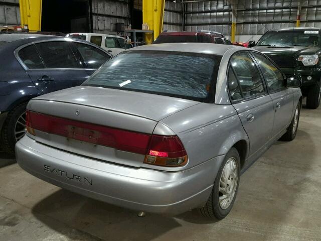 1G8ZJ5271XZ215320 - 1999 SATURN SL2 GRAY photo 4