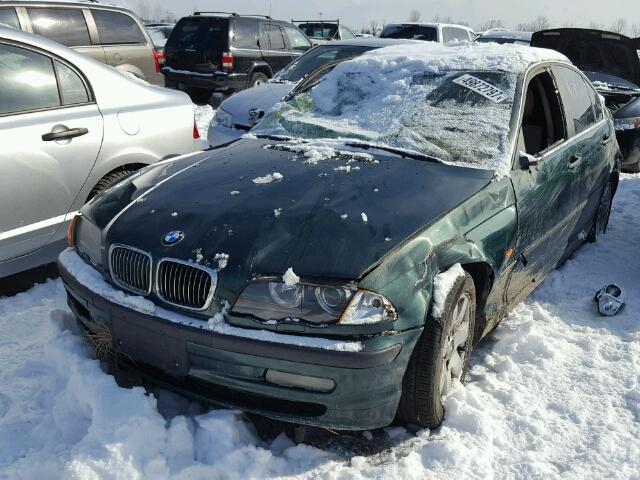 WBAAM5331YFR15148 - 2000 BMW 328 I GREEN photo 2