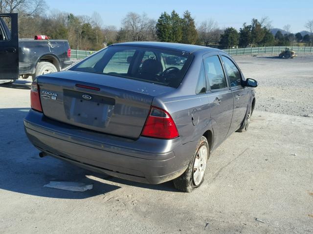 1FAHP34N57W270201 - 2007 FORD FOCUS ZX4 GRAY photo 4