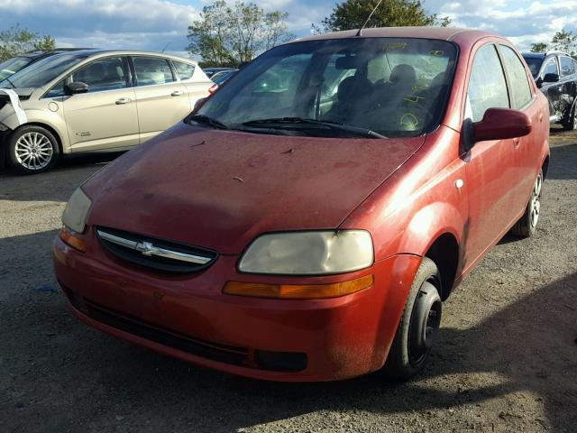 KL1TD56606B577707 - 2006 CHEVROLET AVEO BASE Czerwony zdjęcie 2